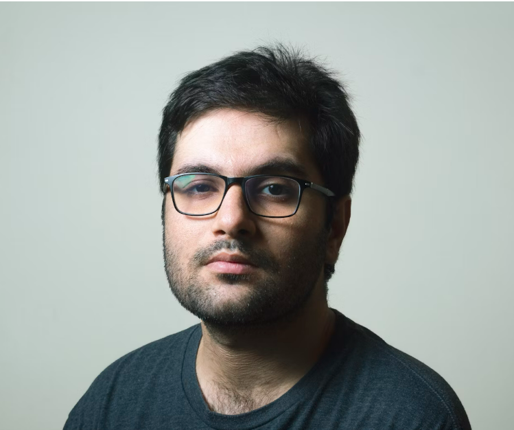 Man in glasses looking serious